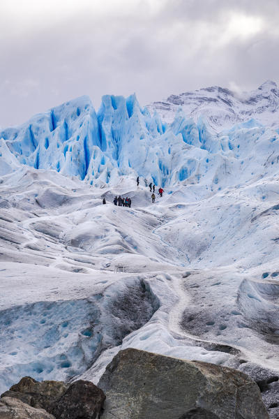 Argentina,Patagonia,Santa Cruz province,Los Glaciares National Park,hikers on the Perito Moreno glacier