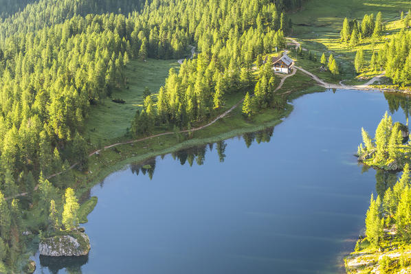 Italy,Veneto,Belluno district,Cortina d'Ampezzo,Federa lake and Croda da Lago hut from an elevated view point