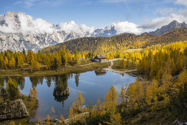Italy,Veneto,Belluno district,Cortina d'Ampezzo,the Federa lake surrounded by larches in autumn dress