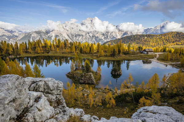 Italy,Veneto,Belluno district,Cortina d'Ampezzo,the Federa lake surrounded by larches in autumn dress