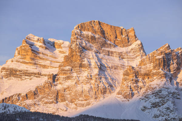 Italy,Veneto,Belluno district,Boite Valley,Borca di Cadore,the first light of sun hits Mount Pelmo