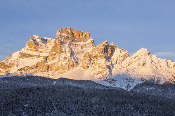 Italy,Veneto,Belluno district,Boite Valley,Borca di Cadore,the first light of sun hits Mount Pelmo