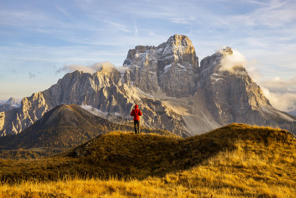 Italy,Veneto,Belluno district,Selva di Cadore,hiker admires the majesty of Monte Pelmo