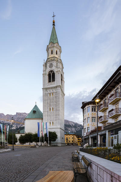 Italy,Veneto,Belluno district,Boite Valley,the bell tower symbol of Cortina d'Ampezzo and Corso Italia,the famous shopping street at dawn