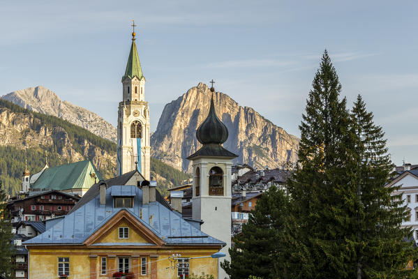 Italy,Veneto,Belluno district,Boite Valley,the church tower of the Basilica of Cortina d'Ampezzo and in the foreground the bell tower of the church of Madonna della Difesa