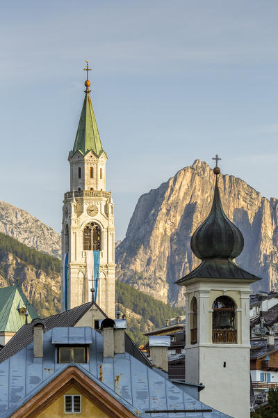 Italy,Veneto,Belluno district,Boite Valley,the church tower of the Basilica of Cortina d'Ampezzo and in the foreground the bell tower of the church of Madonna della Difesa