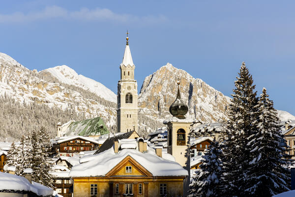 Italy,Veneto,province of Belluno,Boite Valley,the church tower of the Basilica of Cortina d'Ampezzo and in the foreground the bell tower of the church of Madonna della Difesa