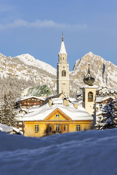 Italy,Veneto,province of Belluno,Boite Valley,the church tower of the Basilica of Cortina d'Ampezzo and in the foreground the bell tower of the church of Madonna della Difesa