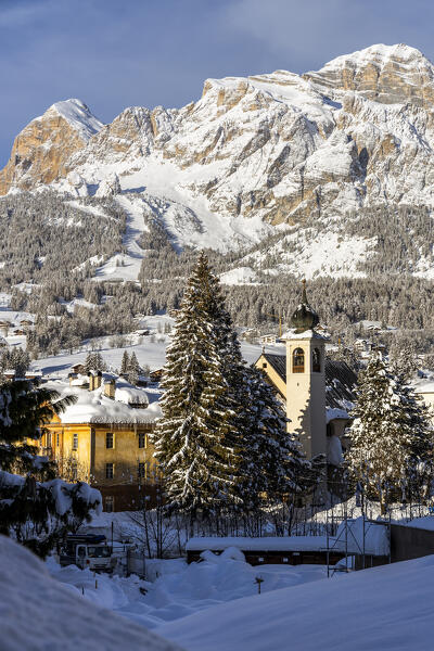 Italy,Veneto,province of Belluno,Boite Valley,view of Tofane group and the bell tower of the church of Madonna della Difesa in Cortina d'Ampezzo