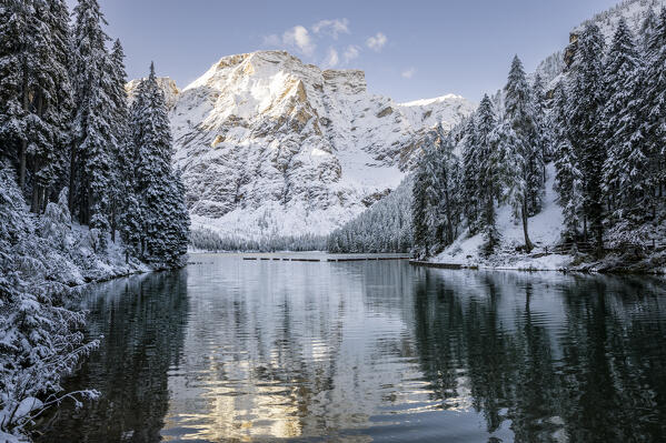 Italy, South Tyrol, Bolzano province, lake Braies after an autumn snowfall