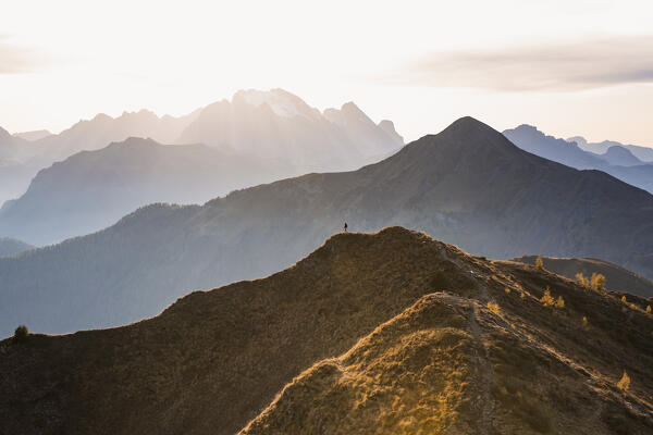 Italy, Veneto, province of Belluno,the sun is setting behind the Marmolada