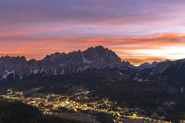 The tourist resort of Cortina d'Ampezzo with the Cristallo Group in the background at dawn, Belluno province, Boite Valley, Veneto, Italy