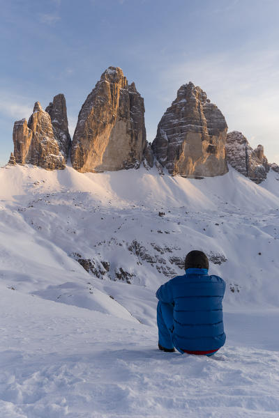 Man looks at the Three peaks,Bolzano district, South Tyrol,Italy,Europe