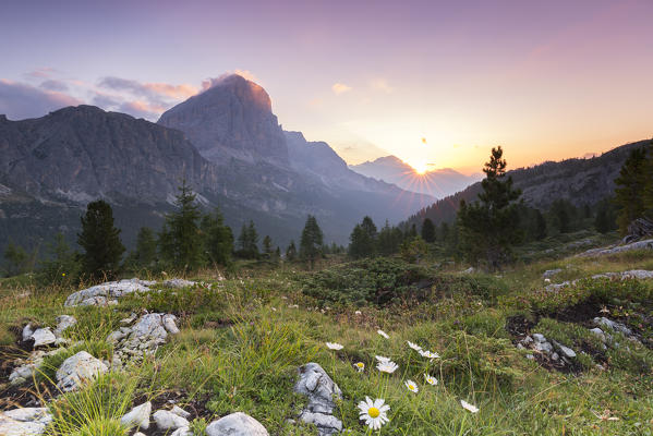 The sun rises behind Mount Cristallo,Cortina d'Ampezzo,Belluno district,Veneto,Italy,Europe