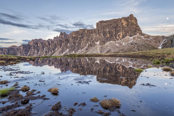 Mount Lastoi de Formin reflected in a pond at dusk,Giau pass,Colle Santa Lucia,Belluno district,Veneto,Italy,Europe