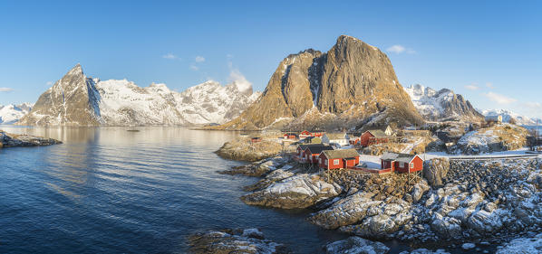 The fishing village with its traditional 'rorbus' in the winter morning light. Hamnoy, Nordland county, Northern Norway, Norway.