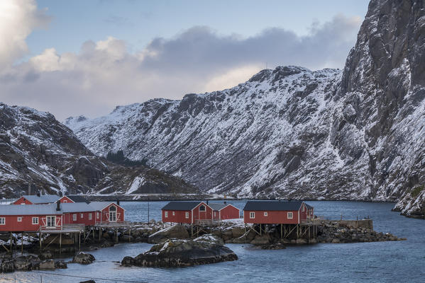 Traditional fishermen houses in the fjord in winter. Nusfjord, flakstad municipality, Nordland county, Northern Norway, Norway.
