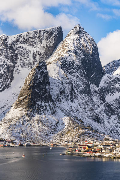 Close-up on Navaren peak and the village of Reine in winter. Lofoten district, Nordland county, Northern Norway, Norway.