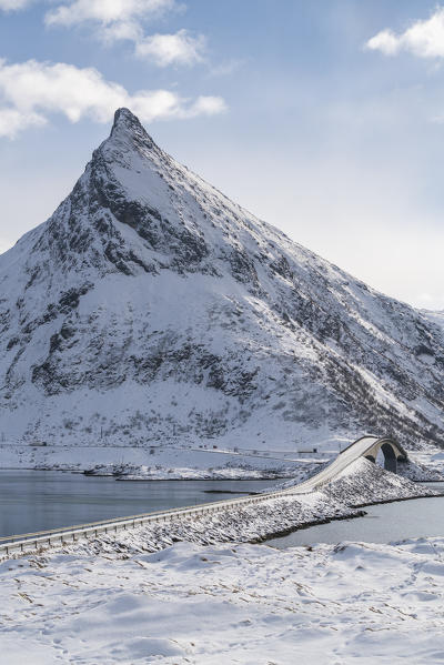 Fredvang Bridge and Volanstind peak in winter. Fredvang, Flakstad municipality, Nordland county, Northern Norway, Norway.