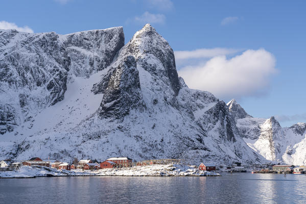 Close-up on Navaren peak and the village of Reine in winter. Lofoten district, Nordland county, Northern Norway, Norway.