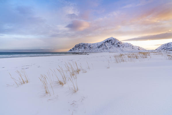 Skagsanden beach at dawn in winter. Flakstad, Nordland county, Northern Norway, Norway.