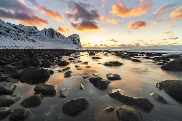 Sunset at Unstad Beach in winter. Vestvagoy municipality, Nordland county, Northern Norway, Norway.