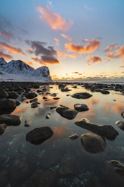Sunset at Unstad Beach in winter. Vestvagoy municipality, Nordland county, Northern Norway, Norway.