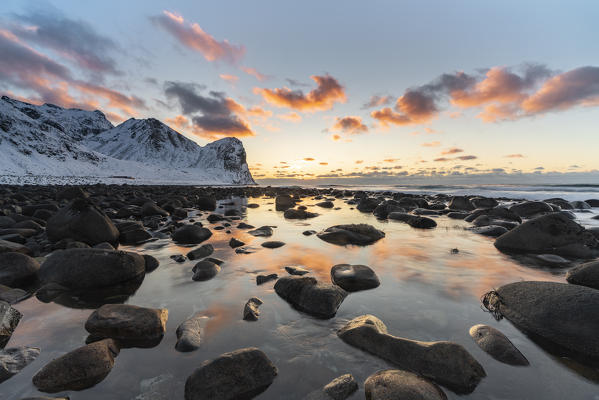 Sunset at Unstad Beach in winter. Vestvagoy municipality, Nordland county, Northern Norway, Norway.