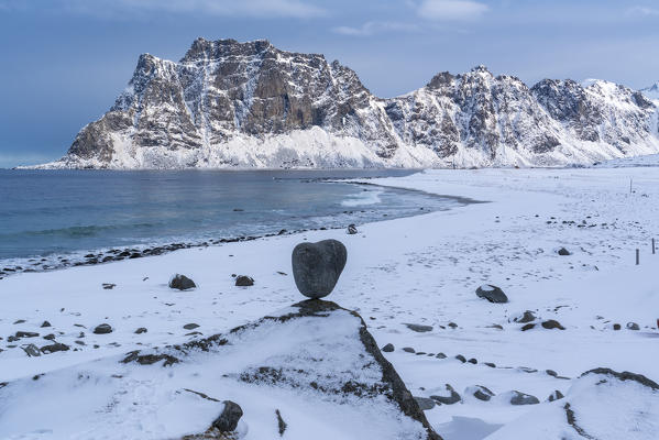 Uttakleiv Beach in winter, with heart-shaped rock in the foreground. Leknes, Nordland county, Northern Norway, Norway.