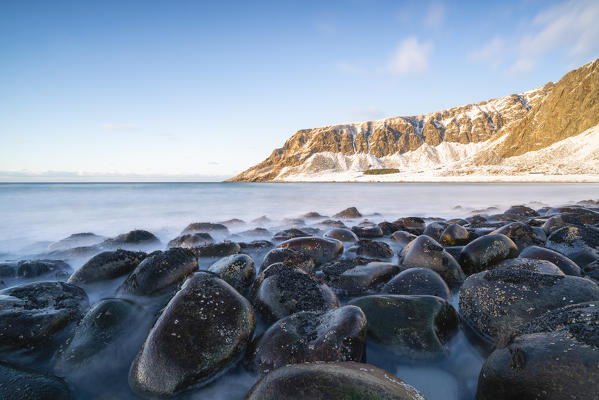 Unstad Beach with Kleivheia mountain in the background in winter. Vestvagoy municipality, Nordland county, Northern Norway, Norway.