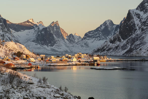 Reine fjord and its harbour in the winter morning light. Reine, Nordland county, Northern Norway, Norway.