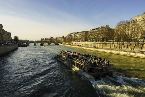 Passenger ferry travelling down the Seine, Paris, France