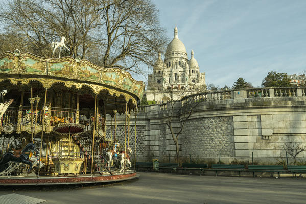 A traditional antique merry-go-round in the gardens of the Basilica du Sacre-Coeur, Montmartre district, Paris, France