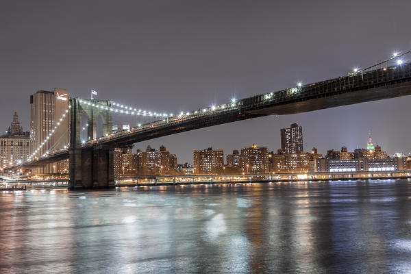 USA, New York City, Downtown Financial district of Manhattan and the Brooklyn Bridge