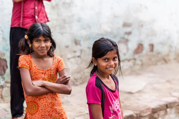 Asia, India, Uttar Pradesh, Nandgaon, Portrait of two Indian little girls