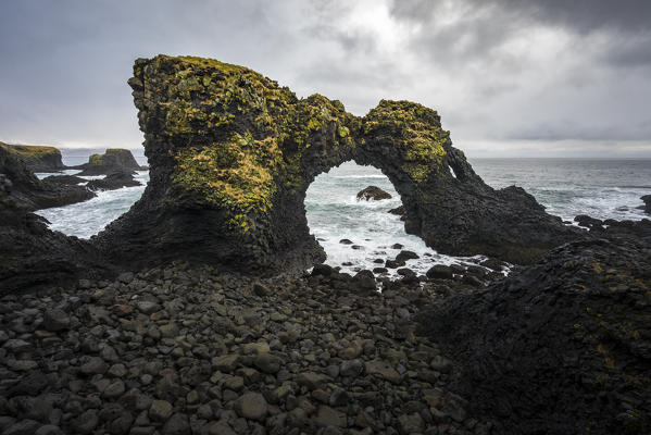 Gatklettur, a rock formation natural arch near Arnarstapi, Snaefellsnes Peninsula, Western Iceland, Europe.