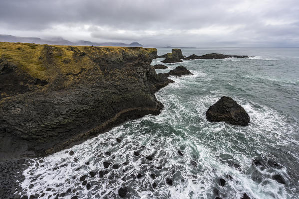 Rock formations above the ocean near Arnarstapi, Snaefellsnes peninsula, Western Iceland, Europe.
