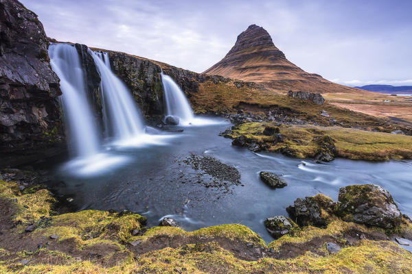 Kirkjufell Mountain, Snaefellsnes peninsula, Western Iceland, Europe. Long exposure landscape with waterfalls.
