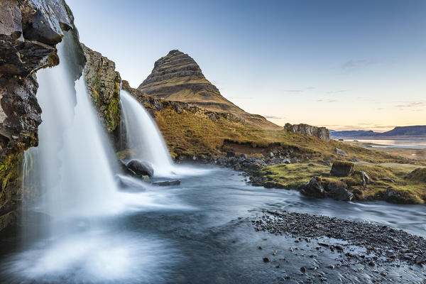 Long exposure landscape with waterfalls and Kirkjufell Mountain, Snaefellsnes peninsula, Western Iceland, Europe.