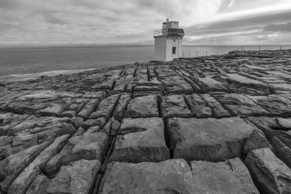 Black and white shot of Blackhead lighthouse. Burren National Park, Munster, Co.Clare, Ireland, Europe.