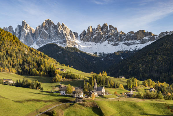 Autumnal landscape with Odle Dolomites peaks on the background. Santa Maddalena, Funes, Bolzano, Trentino Alto Adige - Sudtirol, Italy, Europe.