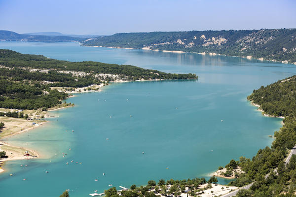 Paddle boats on Lac de Sainte-Croix. Moustiers-Sainte-Marie, Alpes-de-Haute-Provence, Provence-Alpes-Cote d'Azur, France, Europe.