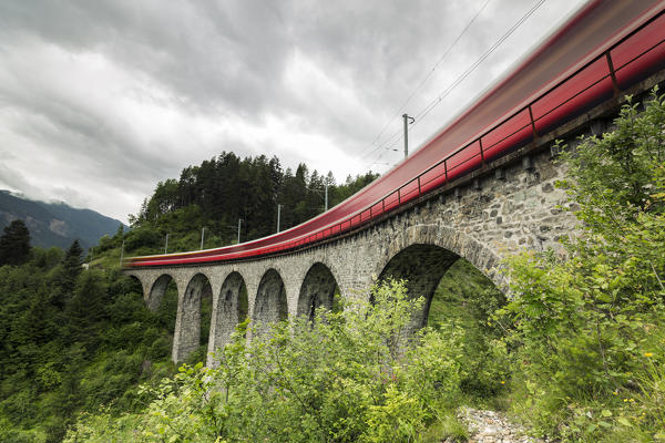 Red Bernina Express train, Filisur, Graubunden, Switzerland