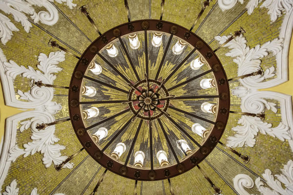 Russia, Moscow, Komsomolskaya Metro. Antique chandelier shot from below.