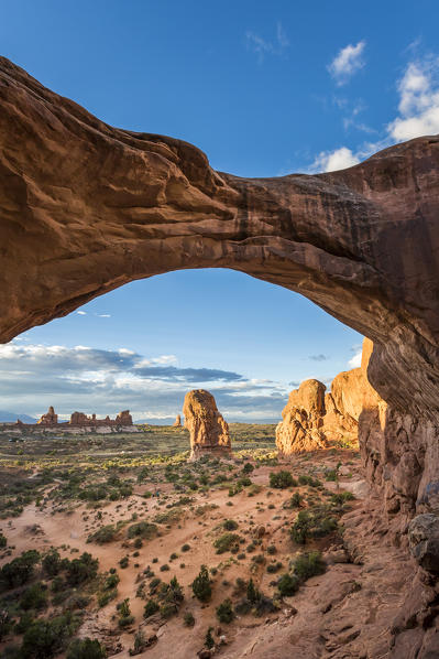 Landscape through Double Arch. Arches National Park, Moab, Grand County, Utah, USA.