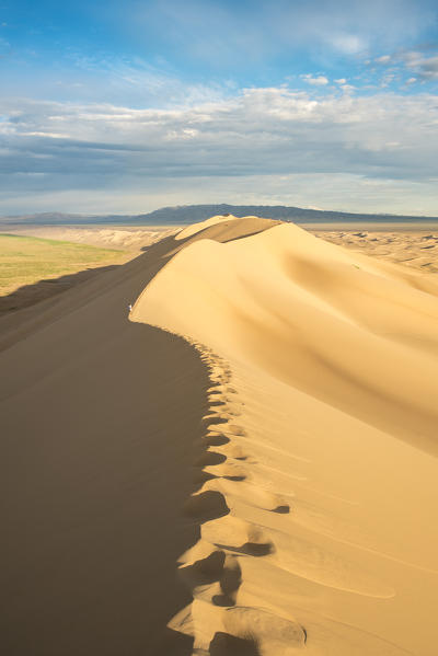 Footsteps on sand dunes in Gobi desert. Sevrei district, South Gobi province, Mongolia.