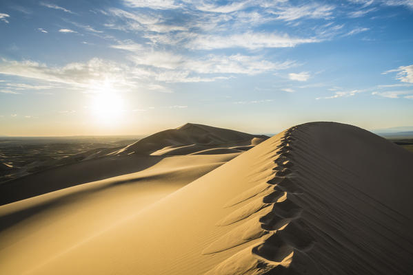 Footsteps on Khongor sand dunes in Gobi Gurvan Saikhan National Park. Sevrei district, South Gobi province, Mongolia.