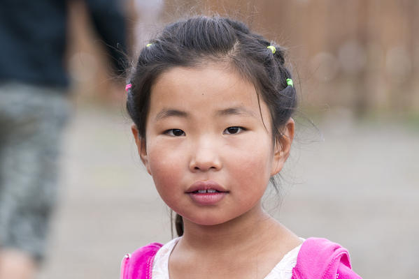 Portrait of a Mongolian little girl. Huzirt, South Hangay province, Mongolia.