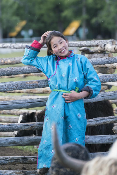 Mongolian nomadic shepherd girl in her traditional dress. Hovsgol province, Mongolia.