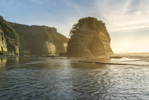 Elephant rock in the morning light. Tongaporutu, New Plymouth district. Taranaki region, North Island, New Zealand.